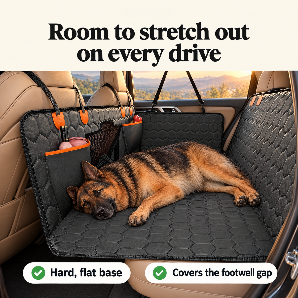 Big dog stretched out across the back seat on the flat extender.